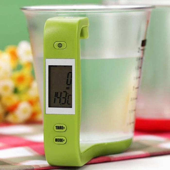 Digital kitchen scale with measuring cup, weight and temperature display