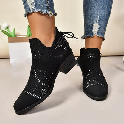Women's plus size mid-calf fashion boot in artificial PU leather, shown in black.