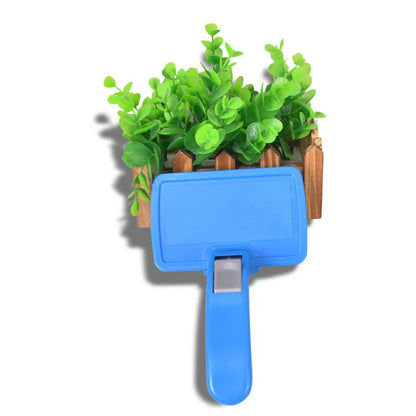 Self cleaning pet brush comb for dogs and cats, plastic grooming tool measuring 16 x 10cm