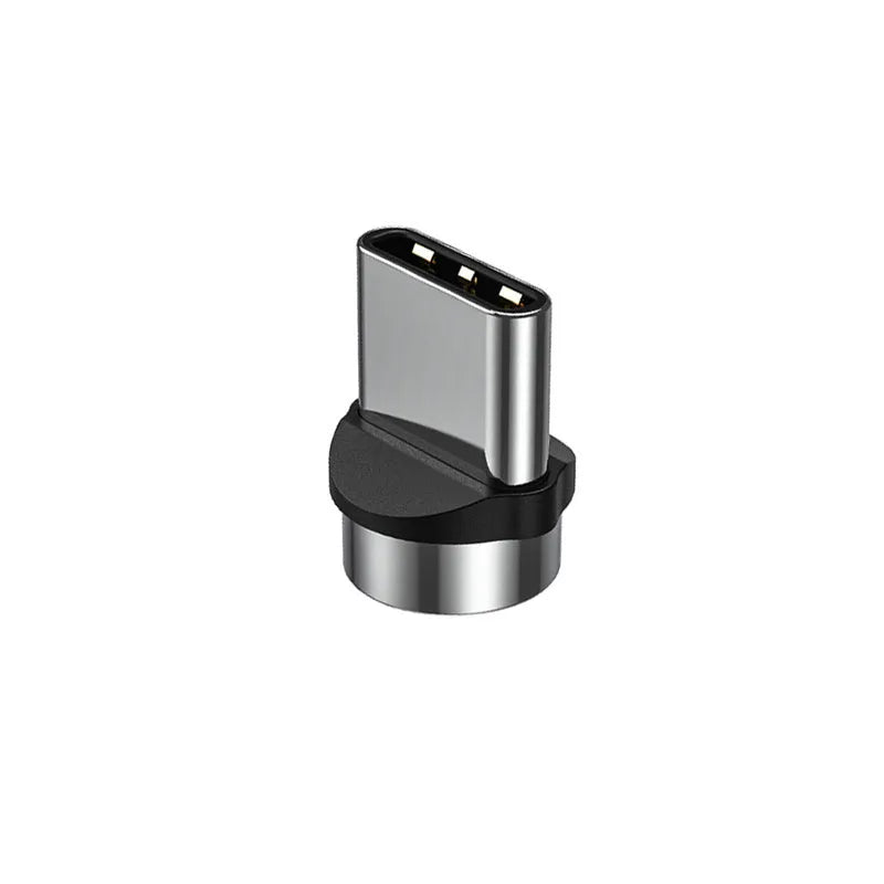 Black spherical magnetic charging cable with rotating head next to iPhone and Android phones