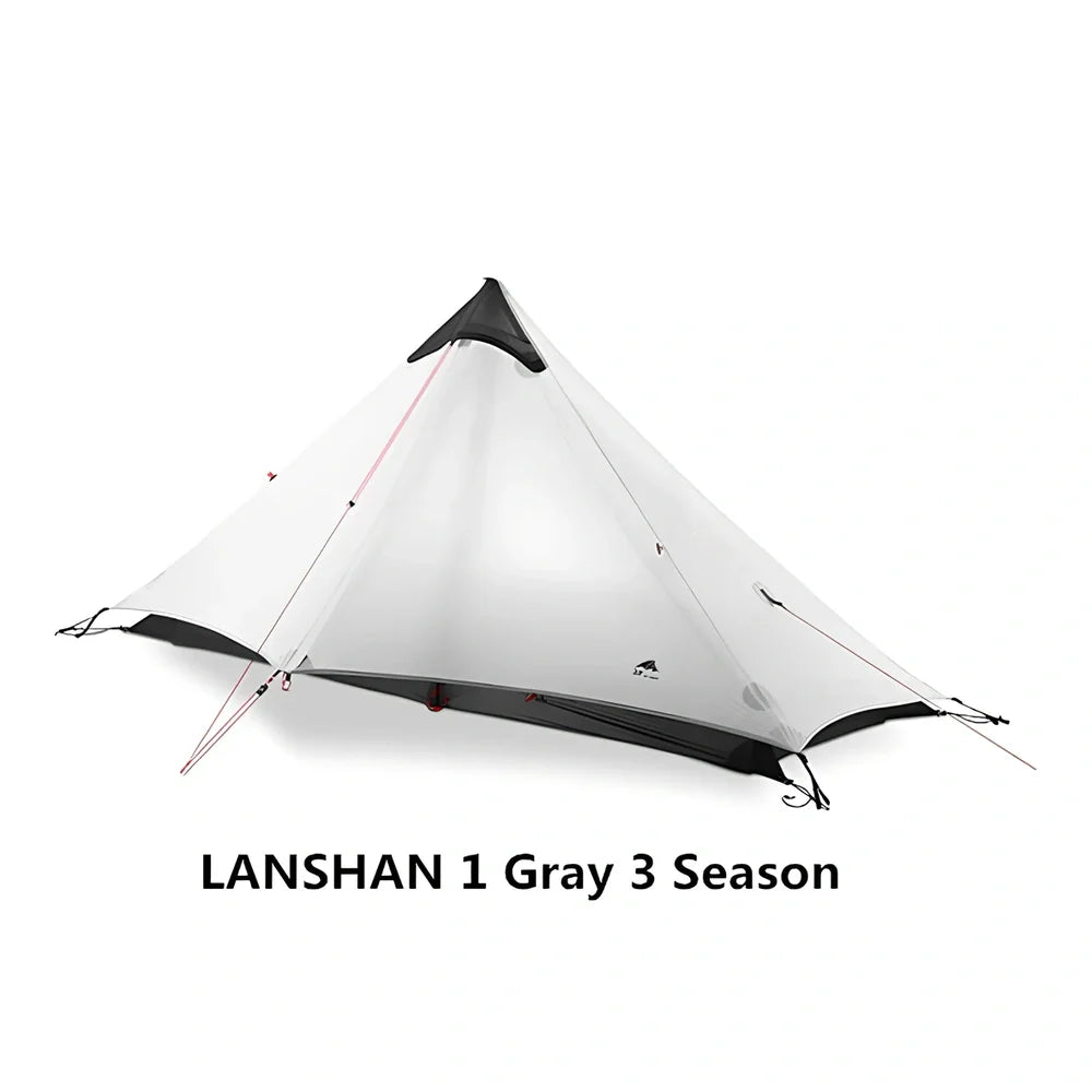 Single tip poleless tent with aluminium supports and camouflage design in outdoor setting