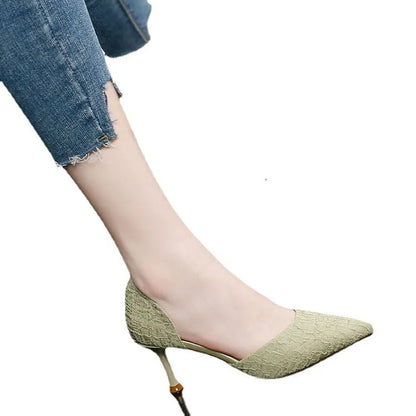 Black pointed-toe stiletto high heel shoes with a 6-8cm heel on a plain background.