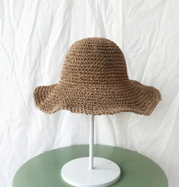 Foldable straw sun hat for women with wide brim for UV protection