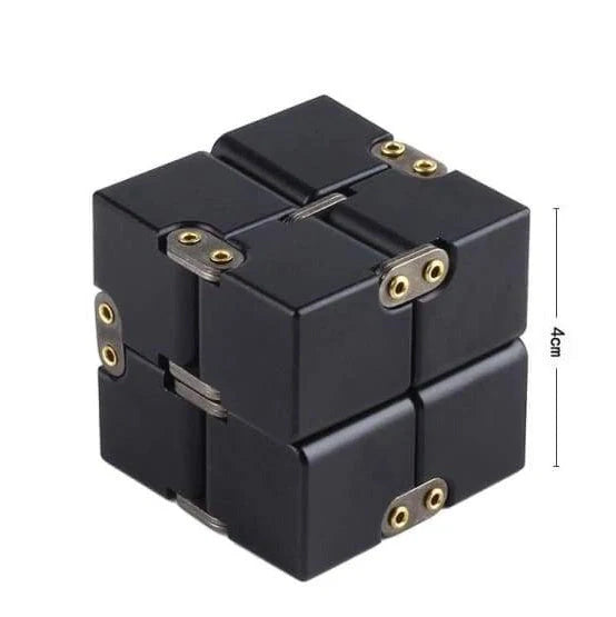 Zinc alloy Infinity Cube with eight rotating cubes showing black and silver colour options on wooden surface