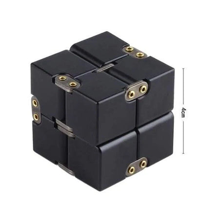 Zinc alloy Infinity Cube with eight rotating cubes showing black and silver colour options on wooden surface