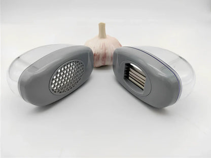 White plastic garlic cutter with stainless steel blades measuring 11cm long