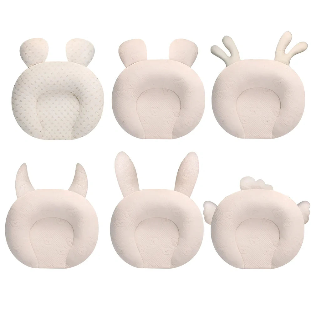 White baby pillow with latex core measuring 30x40cm for infant head support