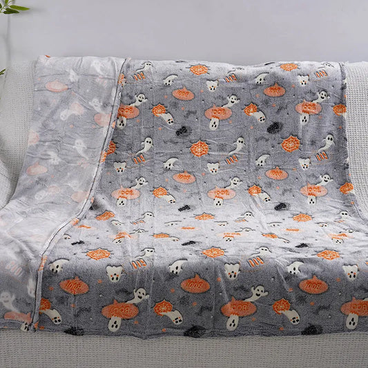 A soft flannel blanket with a cartoon design for a child's bed, shown in one of five colours.