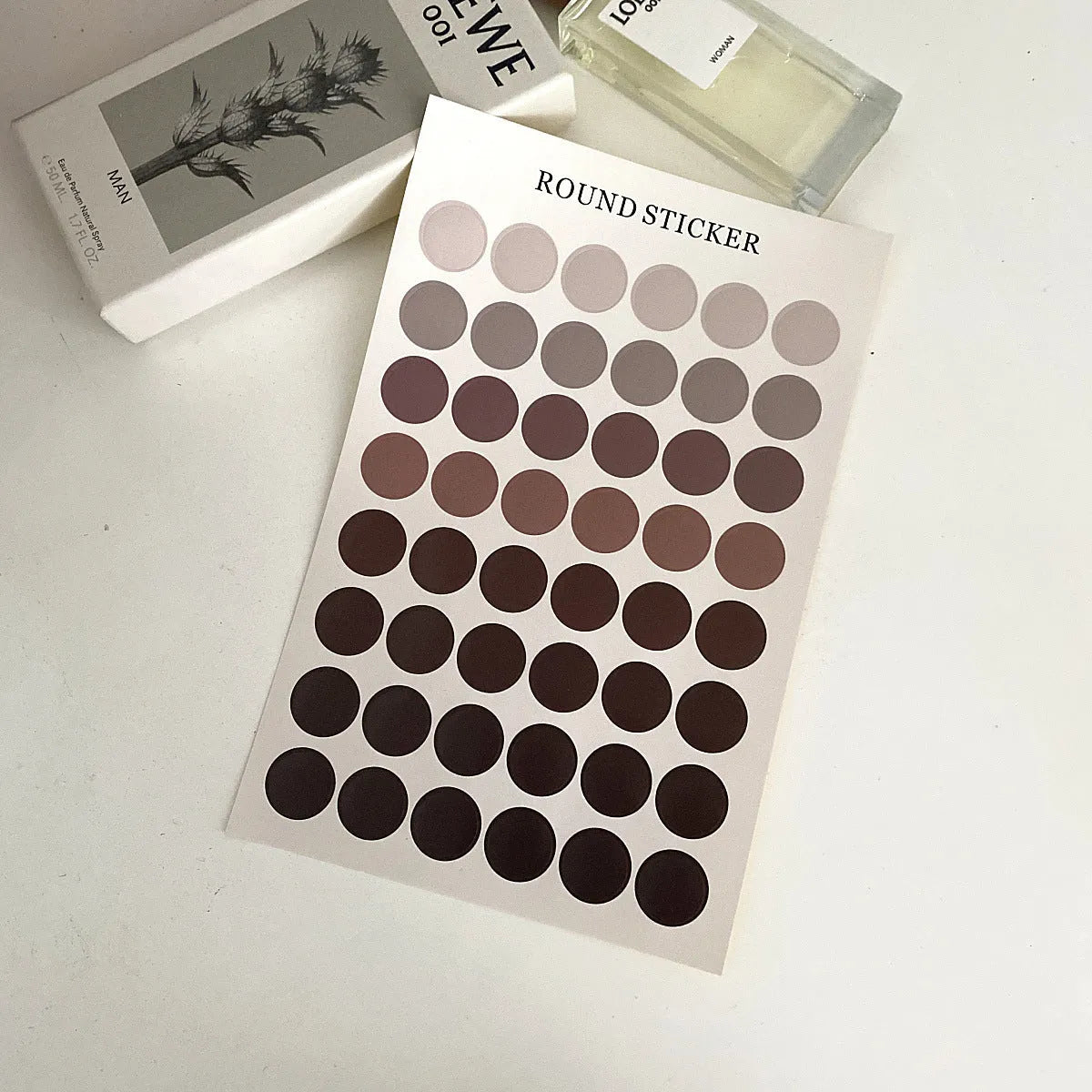 Sheet of 48 round Morandi colour polka dot stickers for marking planner pages.