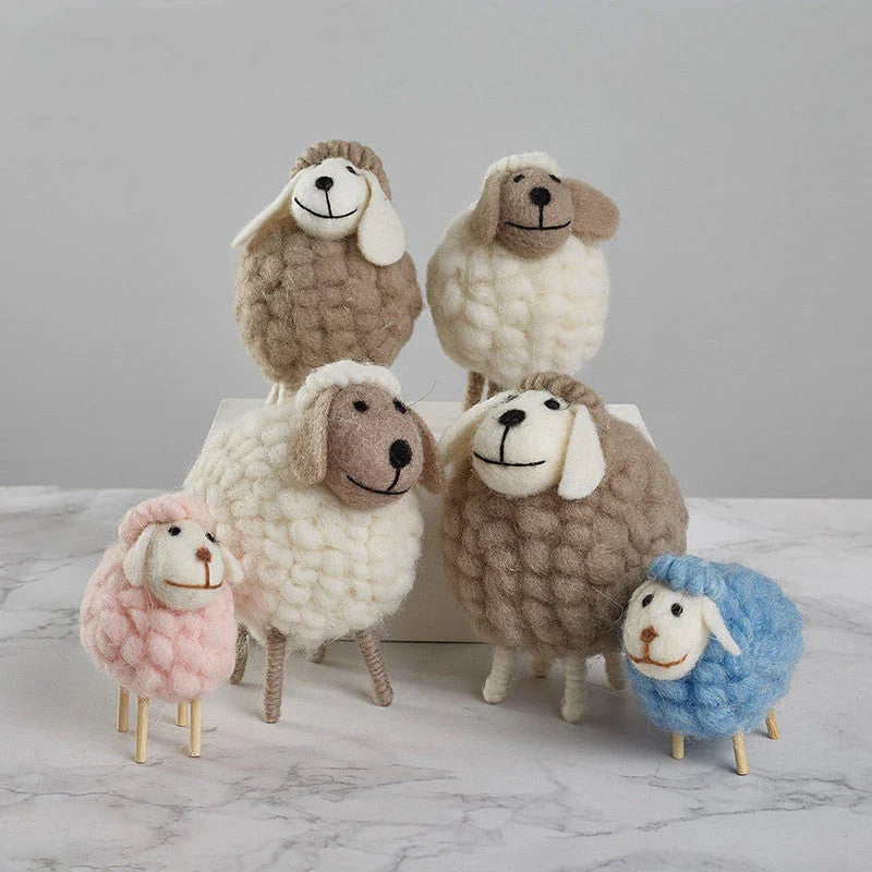 Adorable plush sheep decorations in various sizes and color combinations, perfect for adding a cozy, farmhouse-inspired touch to any home.