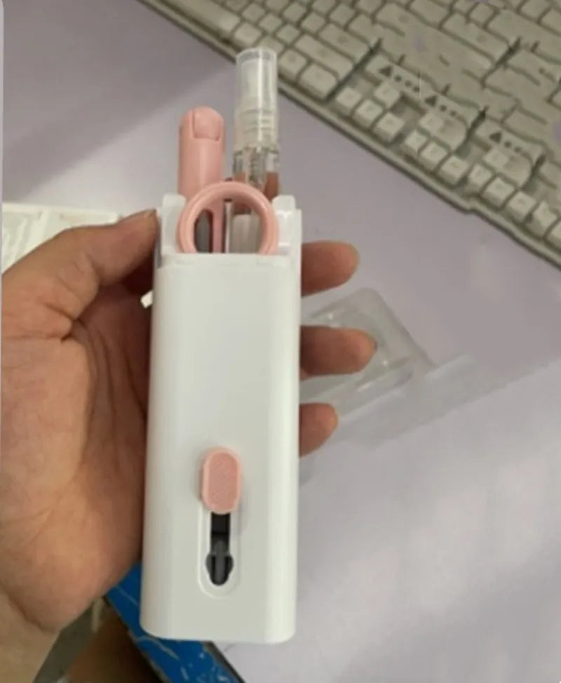 Multifunctional white cleaning pen kit open to show silicone tip, brush, keycap puller, and spray bottle for electronics.