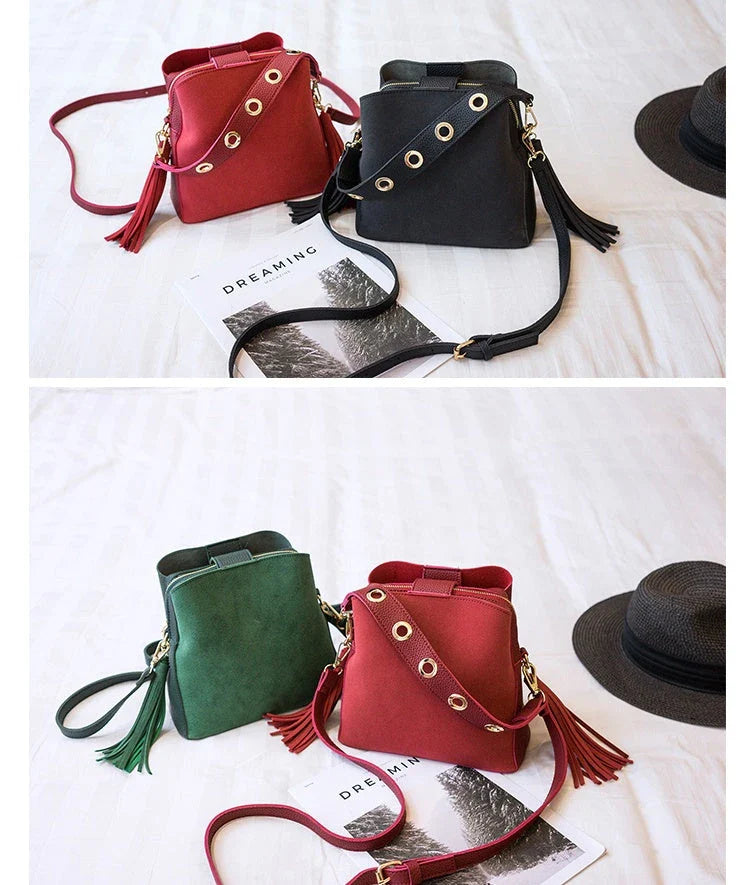 A stylish frosted tassel bucket bag with interior pockets and a versatile shoulder strap design