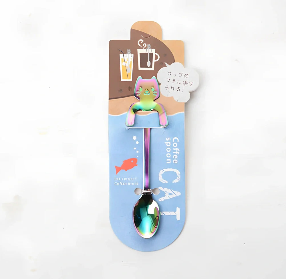Stainless steel coffee spoon with cartoon cat handle design showing 11.7cm measurement scale