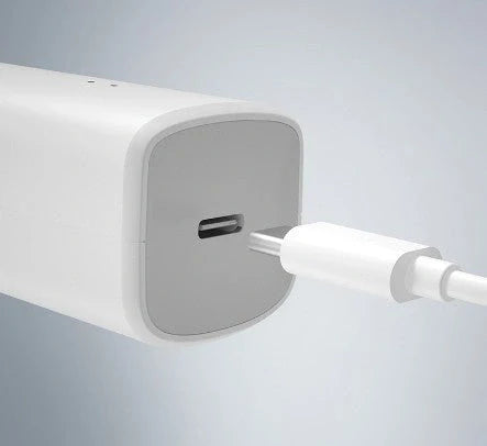 Men's cordless hair clippers with nano ceramic cutter and two-speed control, available in black and white.