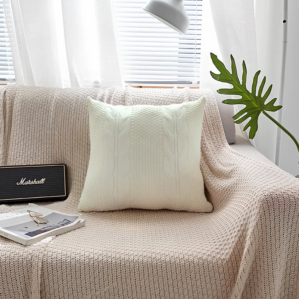 Handmade Nordic wool knit pillowcase with fringe edges measuring 45x45cm in light coffee colour