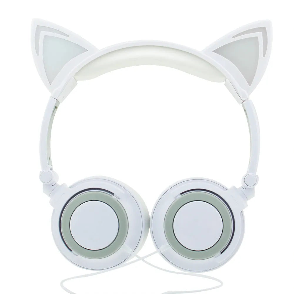 Colourful LED cat ear headphones with illuminated ears and cushions on a black background