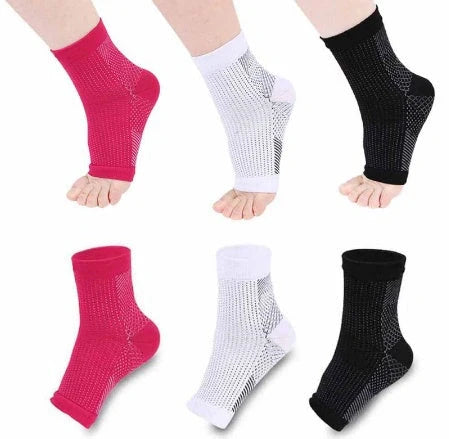 Anti-fatigue compression foot sleeves for men and women in black, red, and white