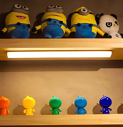 LED body sensor light with wireless charging base and motion detection for cabinet installation