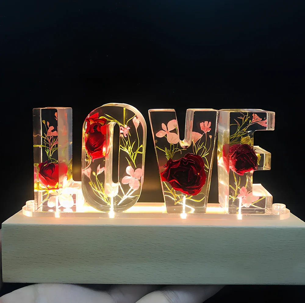 Wooden LOVE letter table lamp with dried flowers and warm LED light for bedroom use