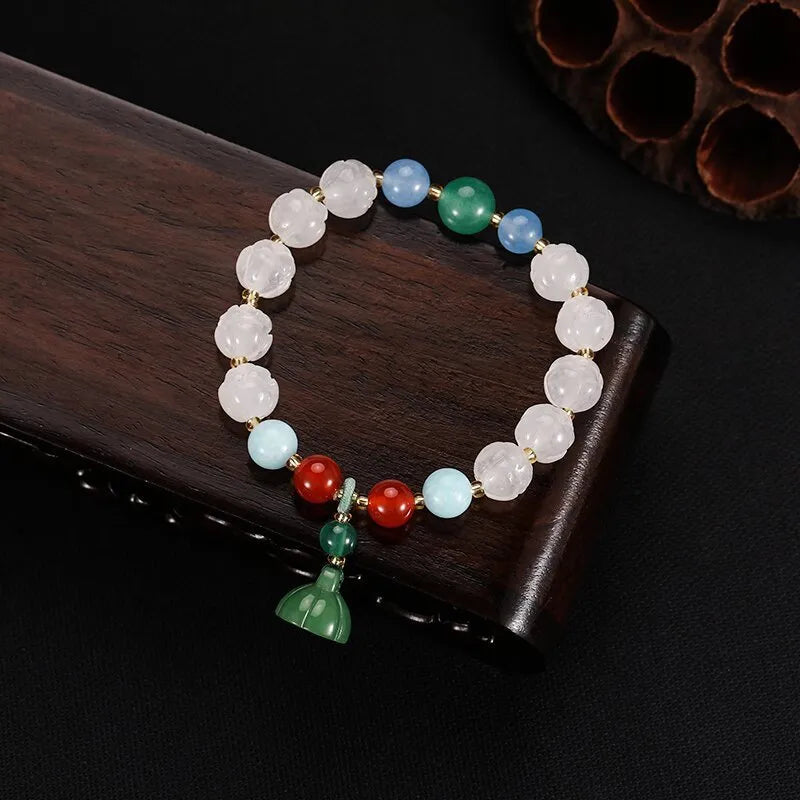 White Bodhi root bracelet with carved pumpkin lotus beads including Apple Orchard and Duobao styles