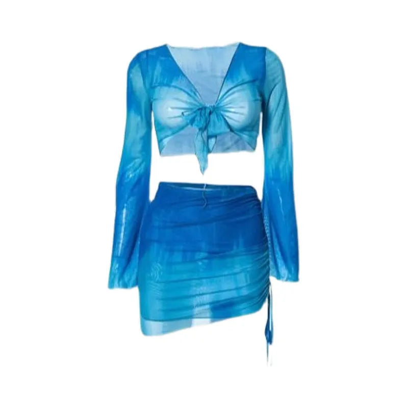 Women's blue high-waisted bikini four-piece set showing shirt, bra, underwear, and skirt pieces