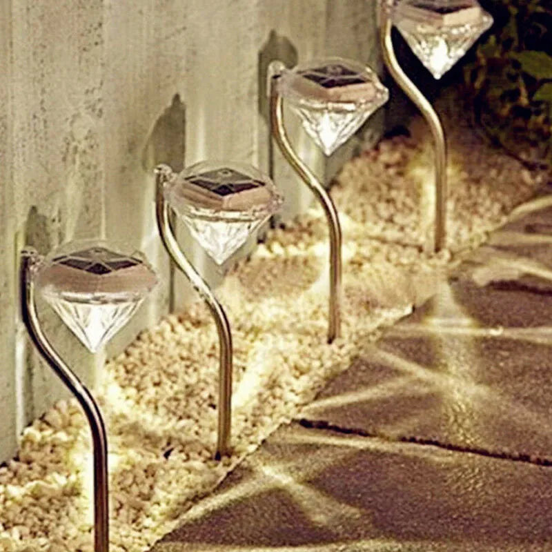 Solar powered garden diamond light with adjustable angle and IP55 waterproof rating for outdoor use