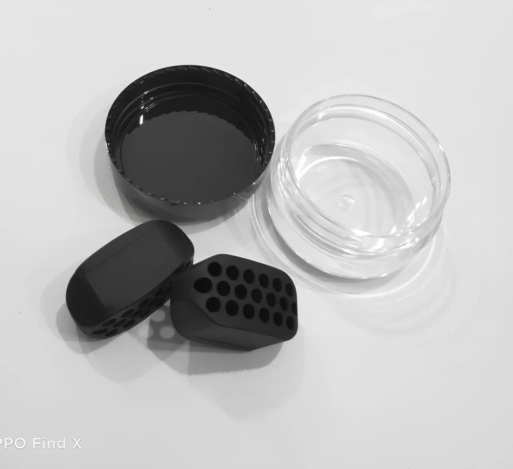 Compact black silicone jaw trainer for muscle shaping, food-grade material, portable at 5cm size for daily facial exercises