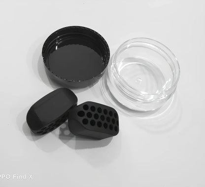Compact black silicone jaw trainer for muscle shaping, food-grade material, portable at 5cm size for daily facial exercises