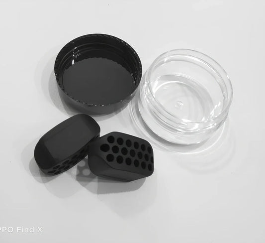 Compact black silicone jaw trainer for muscle shaping, food-grade material, portable at 5cm size for daily facial exercises