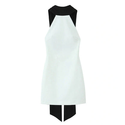 Slim-fitting black patchwork halter dress with asymmetric skirt and high waist detail