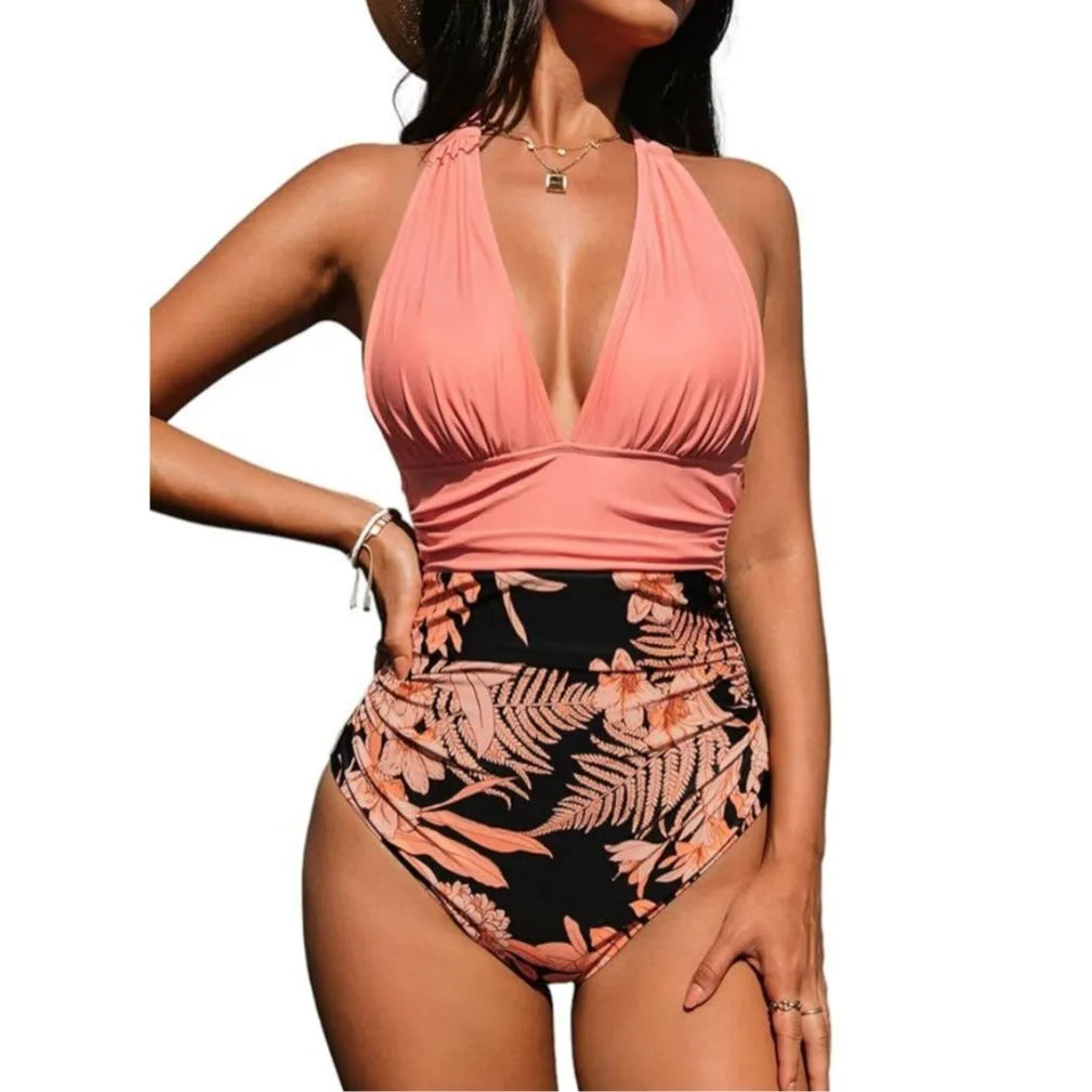 Women's halter neck one-piece swimsuit in quick-drying polyester fabric on a mannequin.