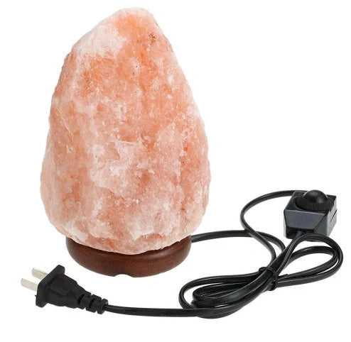 Natural rose crystal salt lamp with rock salt base and soothing glow