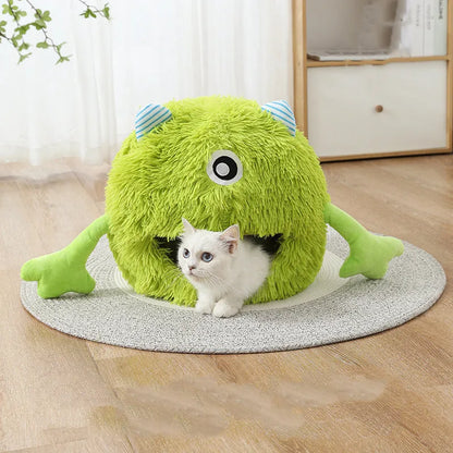 Round fluffy plush cat bed with a non-slip bottom, shown in a medium 40cm size on a wooden floor.