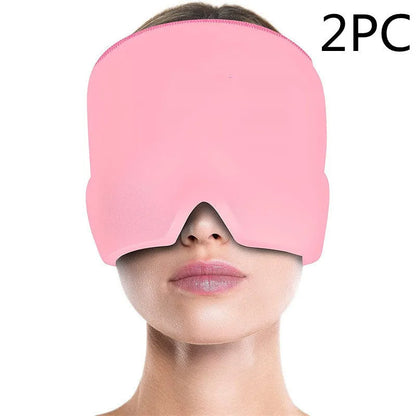 Black elastic cooling gel eye mask for headache relief placed on a forehead.