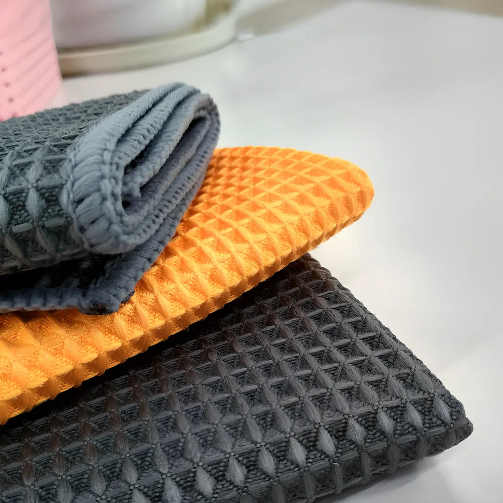 Orange and grey 40x40cm wafer-style car wash towel with microfiber texture