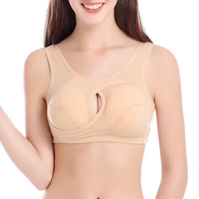 Supportive and comfortable cotton sports bra with crossover design for bust enhancement and posture support during workouts