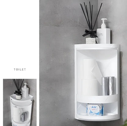 White triangle corner shelf with three tiers mounted in bathroom corner holding toiletries