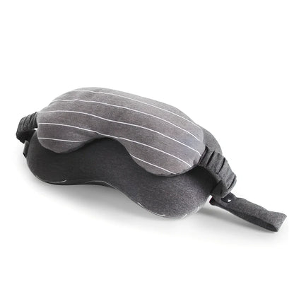 Dark grey two-in-one pillow showing neck support position and eye mask function with 24cm length measurement