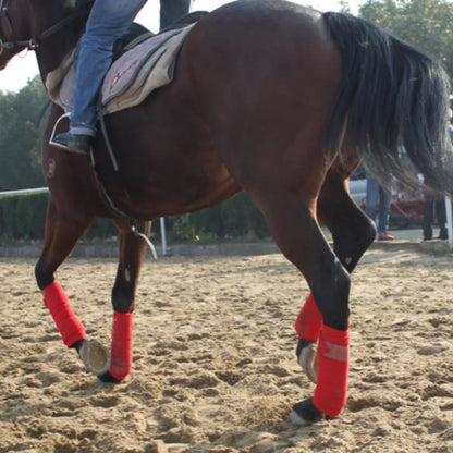 Polar fleece horse leg wraps in blue, grey, black, and red for leg support and protection