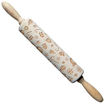 Wooden rolling pin with engraved Christmas patterns including reindeer and snowflakes on a 45cm long barrel.