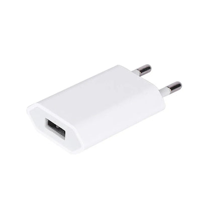 White USB wall charger with UK plug and a white Lightning cable for iPhone and iPad charging