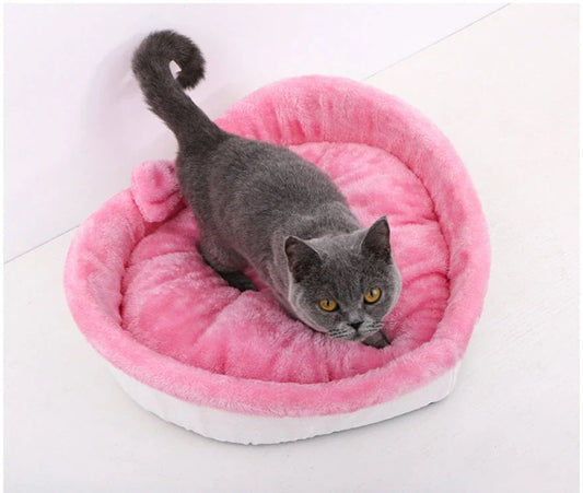 Cozy heart-shaped pet bed in grey and pink colors, suitable for cats and small dogs