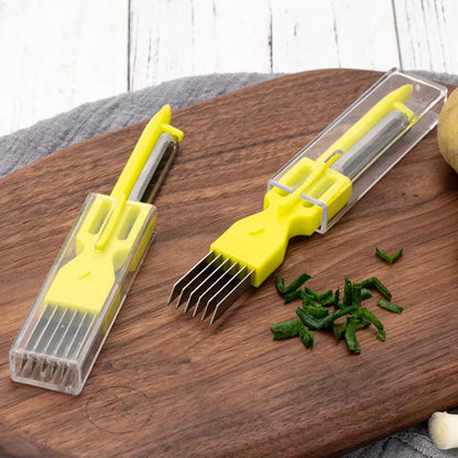 Stainless steel and plastic multi-function fruit and vegetable peeler in yellow