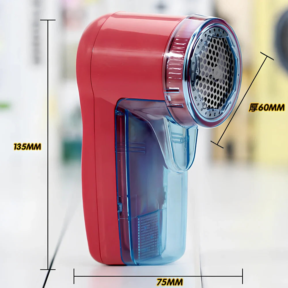 Portable electric lint remover device measuring 11x16x9.5cm with USB charging cable