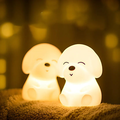 White silicone dog shaped table lamp with touch sensitive nose and colourful LED illumination