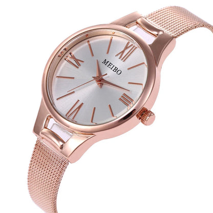 Elegant rose gold women's watch with stainless steel mesh band