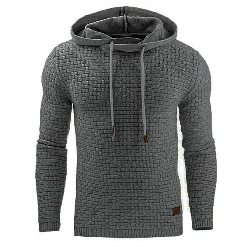 Man wearing a cotton-polyester blend hooded sweatshirt in grey, showing the front design and hood.