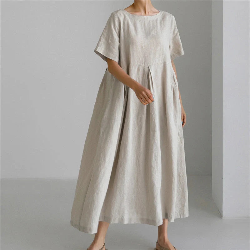 Comfortable cotton linen round neck dress in navy blue, army green, and apricot colors, perfect for casual wear.