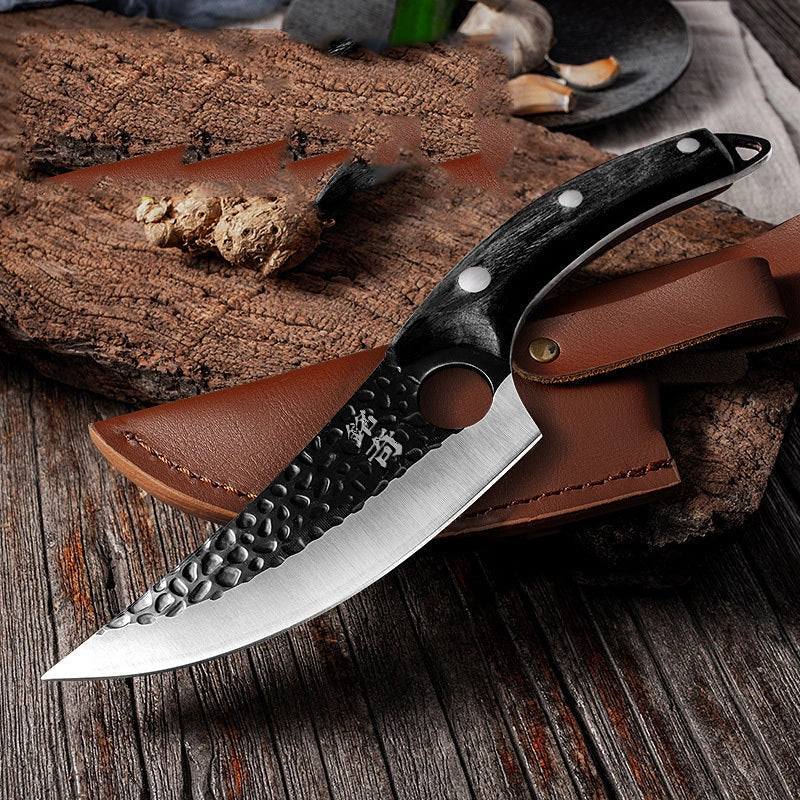 Handcrafted stainless steel boning knife with ergonomic handle for precision cooking tasks