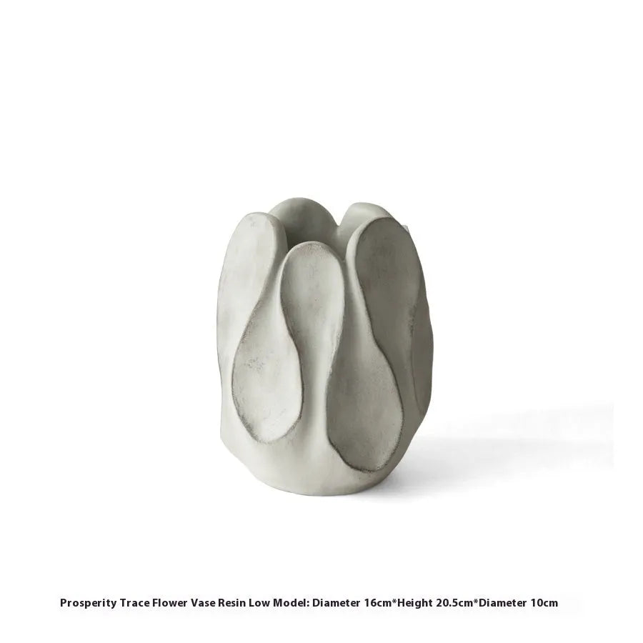 Handcrafted irregular ceramic vase with asymmetrical shape made from magnesium clay for flower arrangements